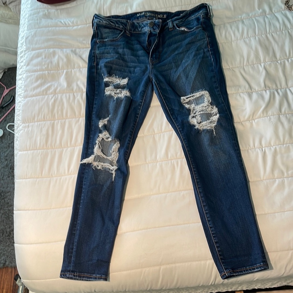 American Eagle Jegging distressed, dark wash. Size 14